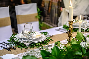 Rustic Wedding Table Setting with Greenery and Candles