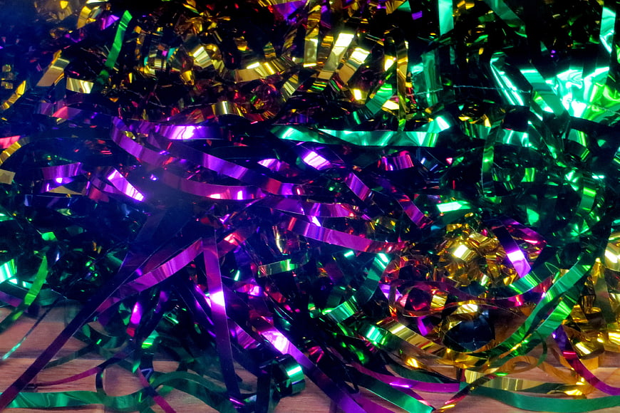Colorful shiny metallic party ribbons background
