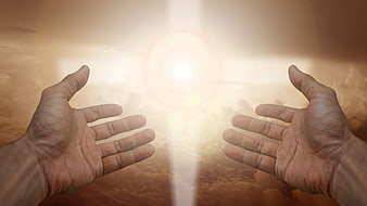 Hands reaching toward divine light in the sky
