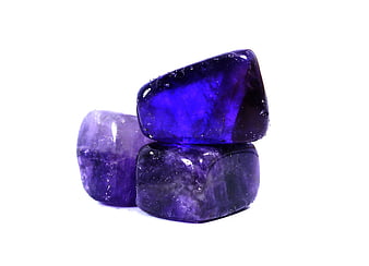 Polished Purple Amethyst Stones on White Background