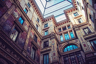 Ornate Historic Building Facade With Glass Atrium Roof