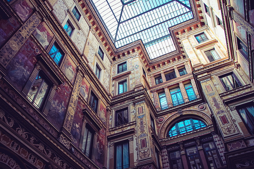 Ornate Historic Building Facade With Glass Atrium Roof