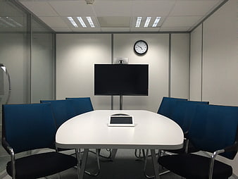 Modern Empty Conference Room with Blue Chairs and TV
