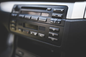 Close-up of vintage car dashboard radio and climate controls