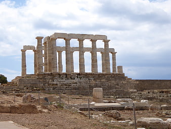 Ancient Greek Temple Ruins on Sunny Day