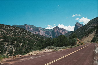 Winding Road Through Red Rock Canyon Landscape