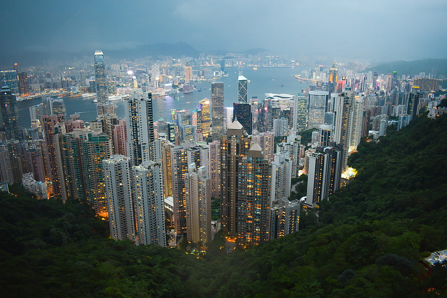 Hong Kong Cityscape at Dusk with Victoria Harbour and High-Rise Buildings