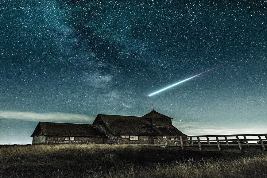 Rural Barn Under Starry Night Sky with Shooting Star