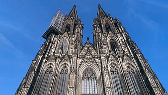 Cologne Cathedral Gothic Facade Against Blue Sky