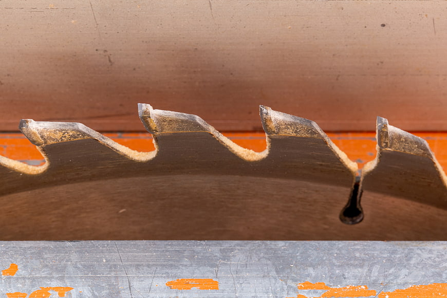 Close-up of rusty circular saw blade teeth