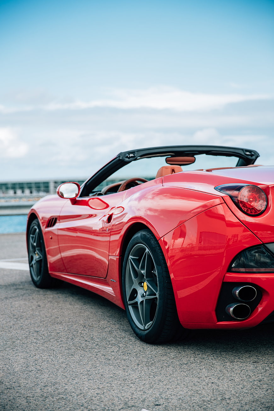 Red Ferrari California T Convertible Rear Side View