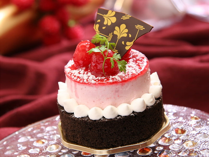 Elegant Raspberry Chocolate Cake with Gold Garnish