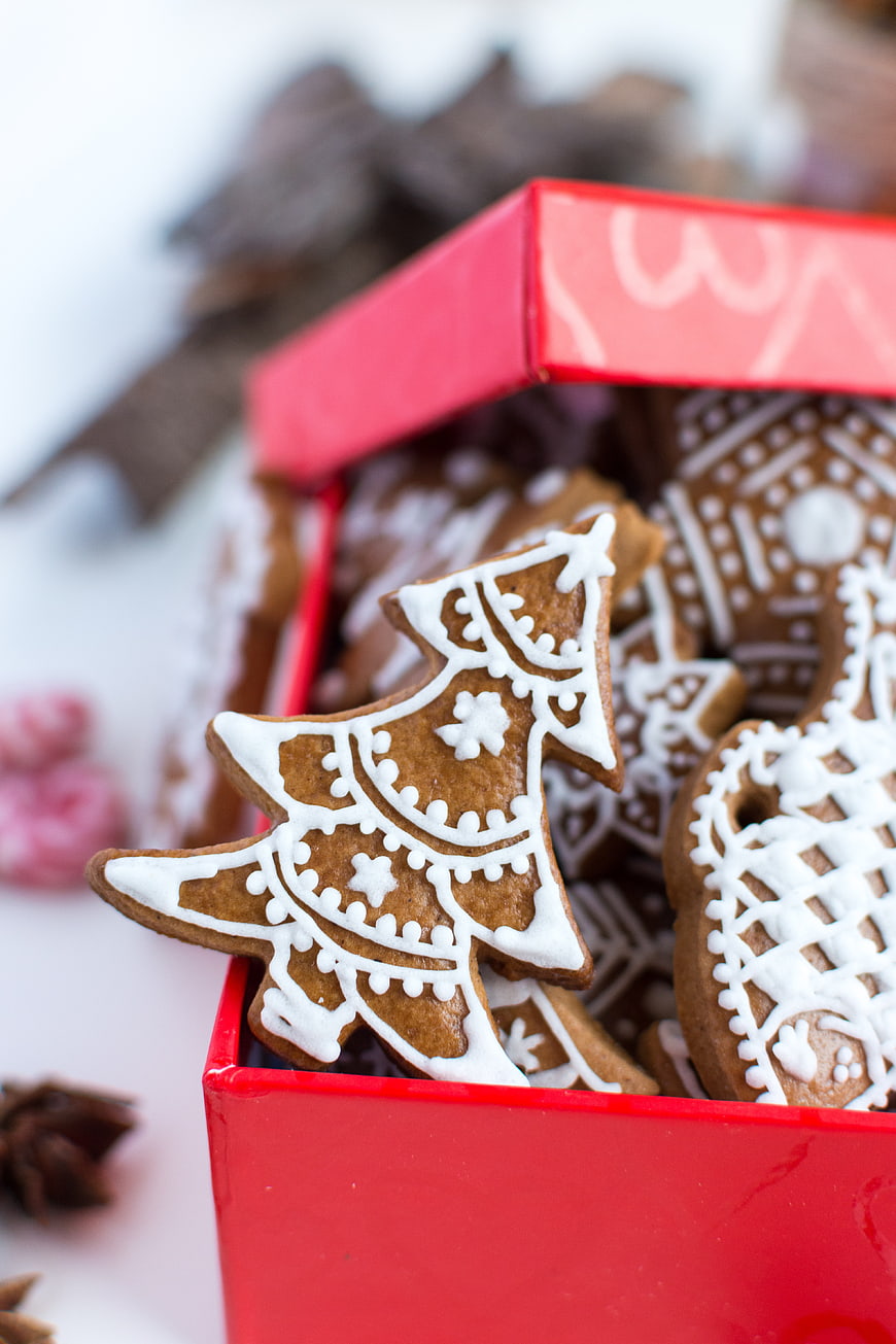 Traditional Christmas gingerbread cookies in a red gift box