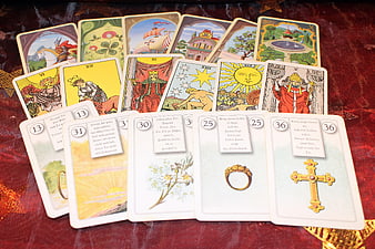 Tarot and Oracle Card Spread on Red Velvet Cloth