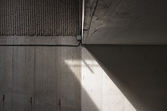 Abstract Concrete Wall with Sharp Diagonal Shadow