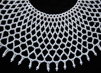 White Pearl Beaded Collar Necklace on Black Background