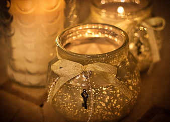 Warm Glowing Candle In Glass Jar With Ribbon And Key Charm
