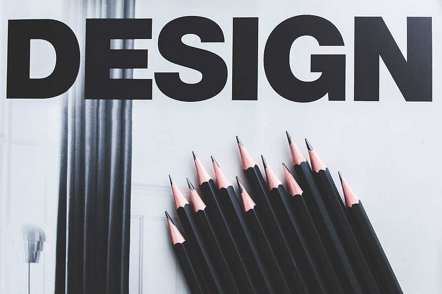 Black Pencils Arranged On Design Magazine Cover