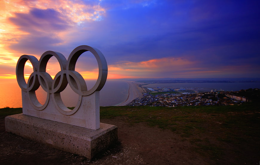 Olympic Rings Monument at Sunset Over Weymouth Bay and Coastline