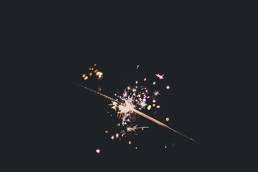 Sparkler Burning Against Dark Background
