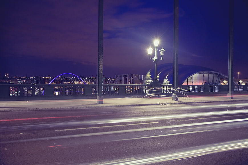 Long Exposure Night Cityscape with Light Trails and Bridge