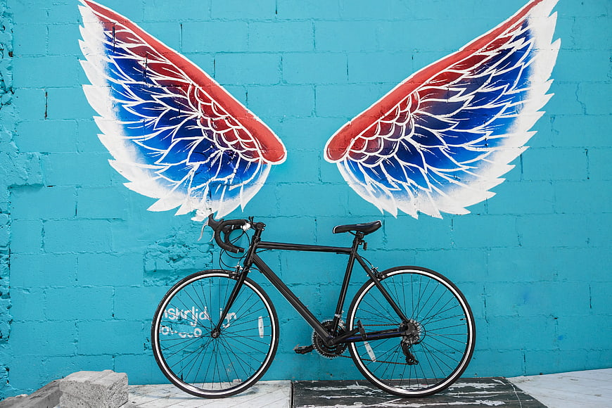 Black Road Bike with Red Blue White Wing Graffiti