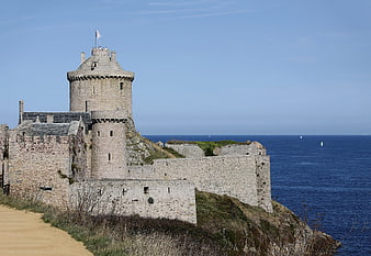 Medieval coastal fortress overlooking the blue Atlantic Ocean