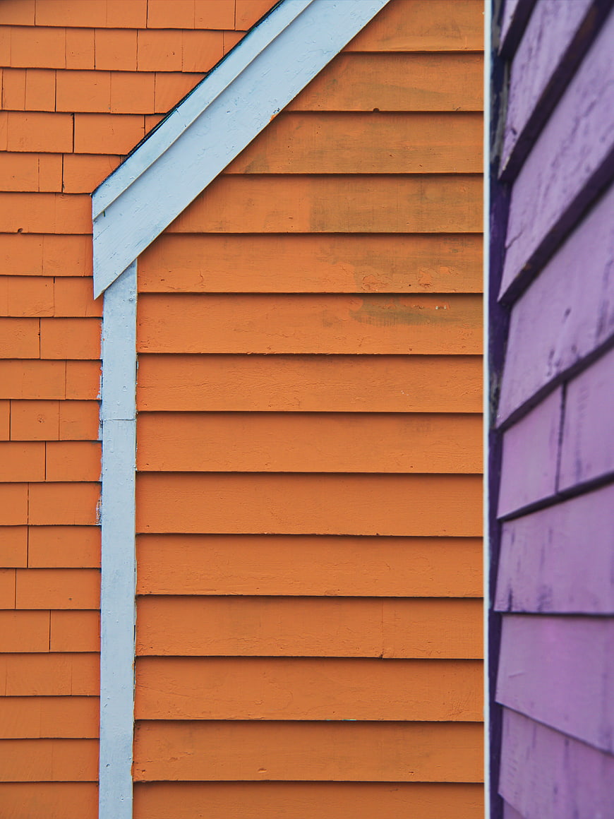 Abstract Colorful House Siding with Orange and Purple Walls