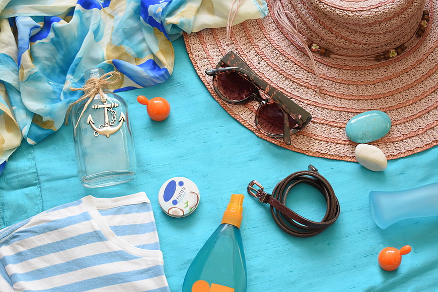 Summer Beach Accessories Flat Lay With Sunscreen And Straw Hat