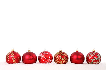Red Christmas Ornaments On White Snow Background