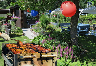 Summer Garden Barbecue Party with Grilled Sausages and Balloons