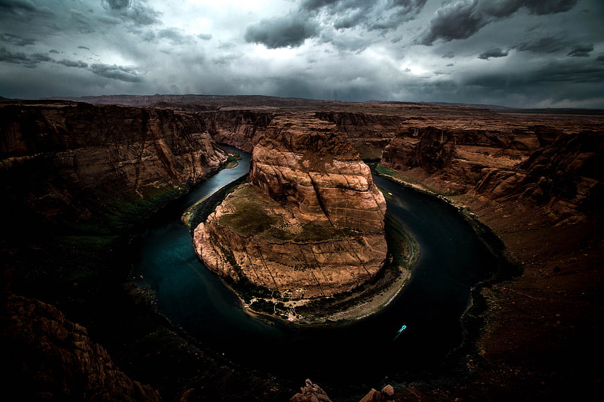 Dramatic Horseshoe Bend Landscape with Stormy Sky