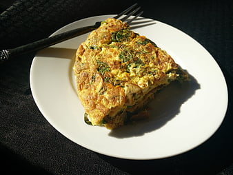 Spinach and Mushroom Omelette on White Plate with Fork