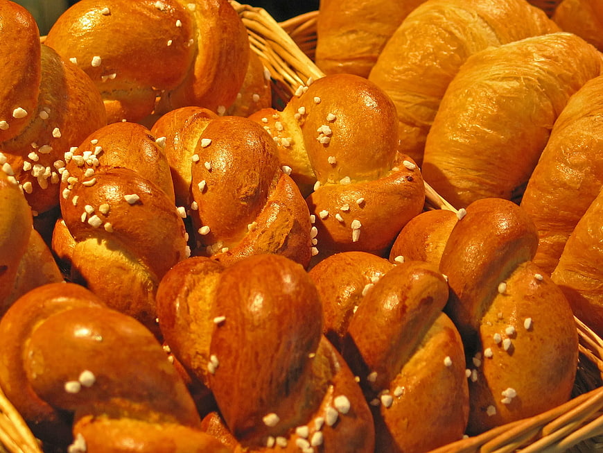 Freshly Baked Pretzels and Croissants in Wicker Basket