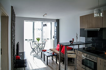 Modern Open Plan Apartment Interior With Kitchen And Dining Area