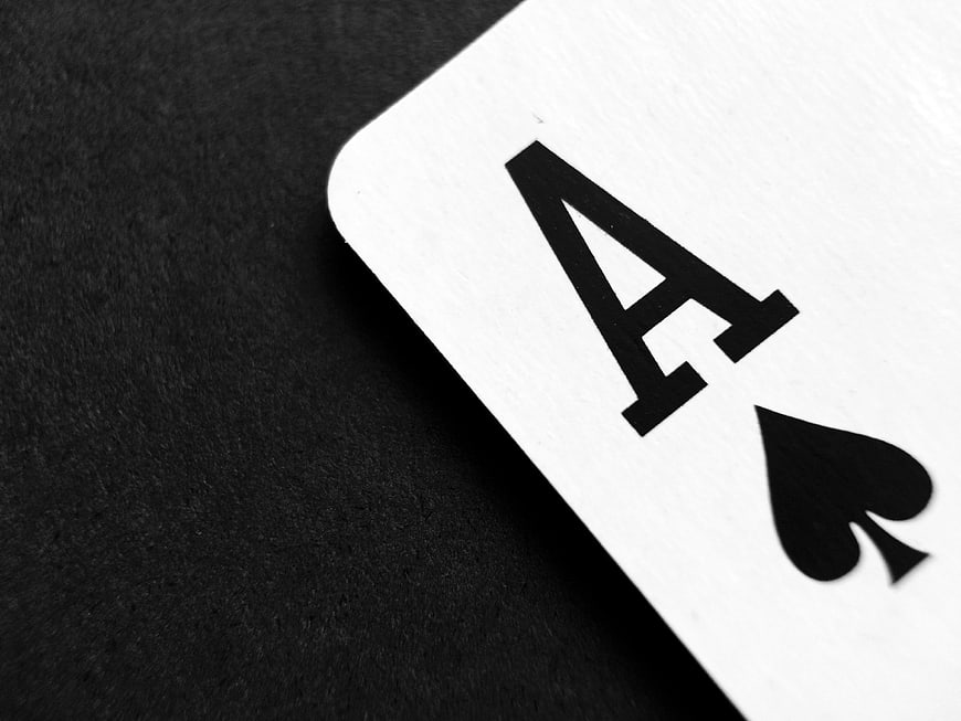 Close-up of Ace of Spades Playing Card on Black Background