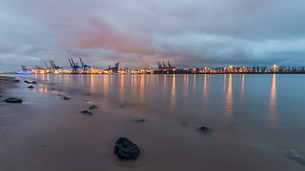 Long Exposure Industrial Port at Dusk with Reflections