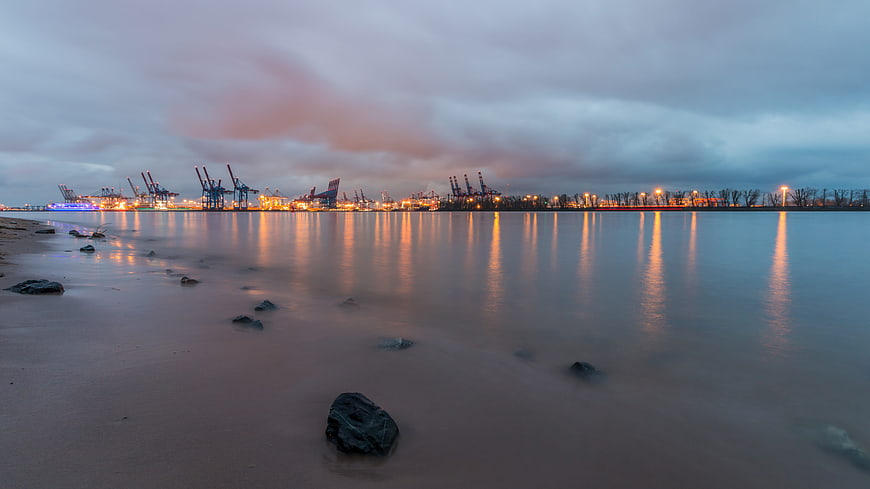 Long Exposure Industrial Port at Dusk with Reflections