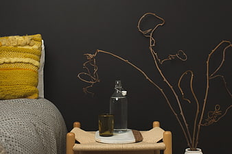Modern Interior Still Life with Yellow Pillow and Dried Branches