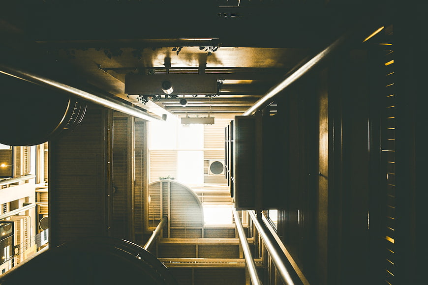 Modern architectural staircase with dramatic lighting and perspective