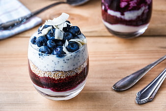 Blueberry Chia Parfait in Glass on Wooden Table
