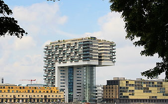 Modern Cantilevered Apartment Building in Urban Cityscape