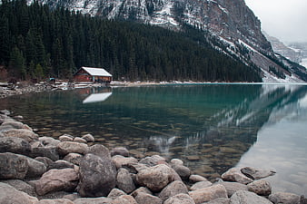 Serene Lake Louise Cabin Reflection Rocky Shoreline