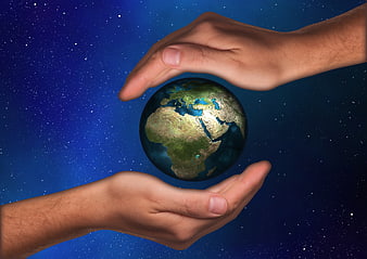 Hands Protecting Earth Globe Against Starry Night Sky Background