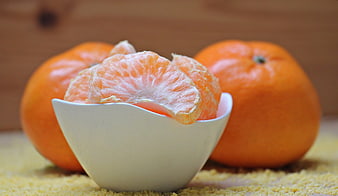 Fresh Mandarin Orange Slices in White Bowl