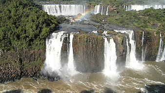 Iguazu Falls Waterfall Nature Landscape With Rainbow And Tropical Forest