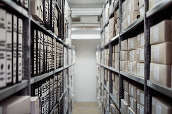 Warehouse Archive Aisle with Filing Boxes and Storage Shelves