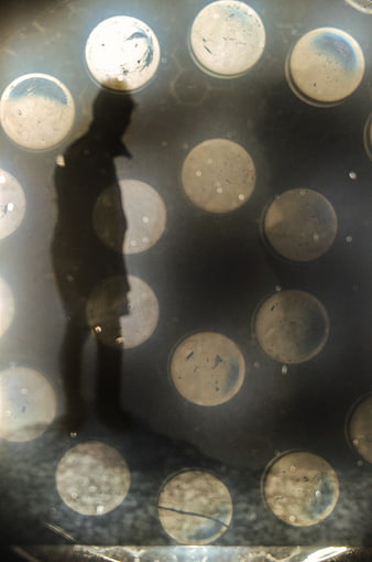 Vintage 35mm film slide with photographer silhouette