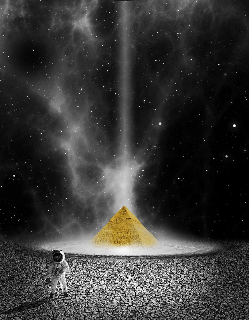 Astronaut standing before glowing pyramid in space