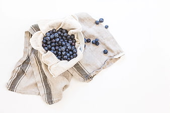 Fresh Blueberries in Bowl on Linen Cloth
